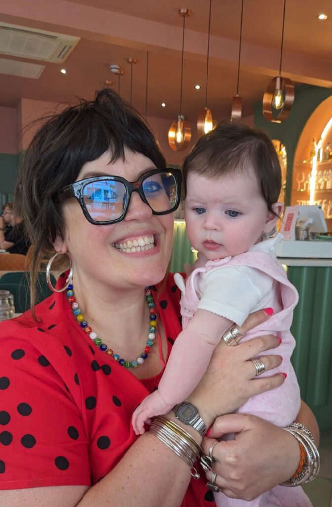 Rose and her daughter in a restaurant.