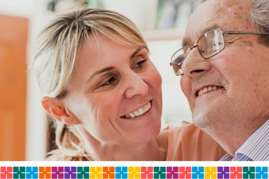 Woman caring for elderly man