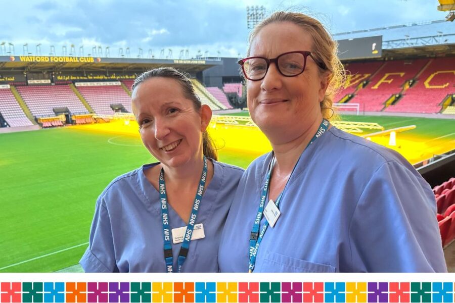 Health care assistants standing at Watford Football Club