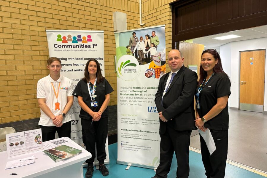 Organisers of the Broxbourne volunteers fair in front of display boards. From left: Jeremy Stace (Communities 1st), Cathy Reily (senior social prescriber), Steve Whitlam (community development manager at Broxbourne Borough Council) and Allison Johnson (senior social prescriber).